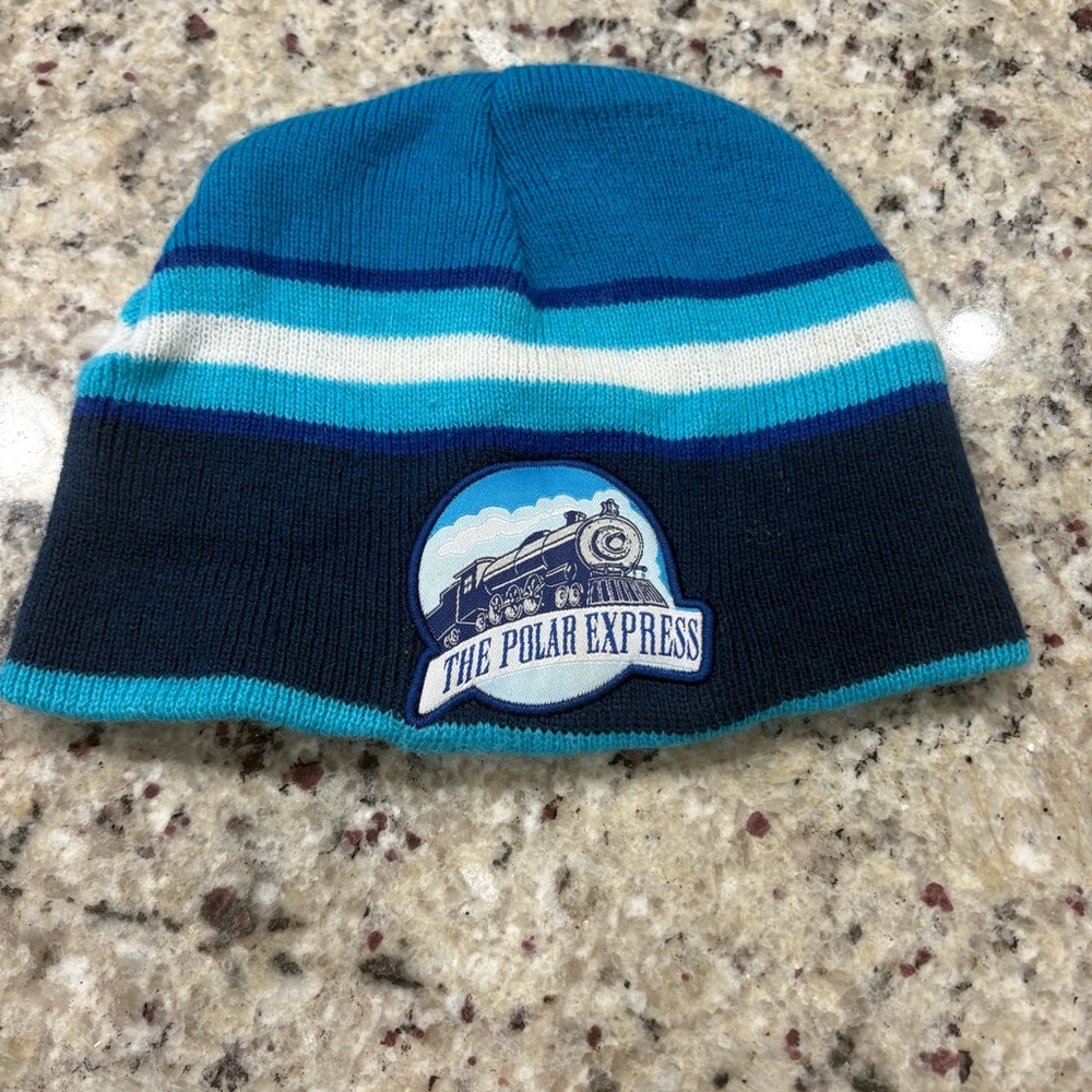 The Polar Express shaded of blue beanie Worn once Good Used Condition